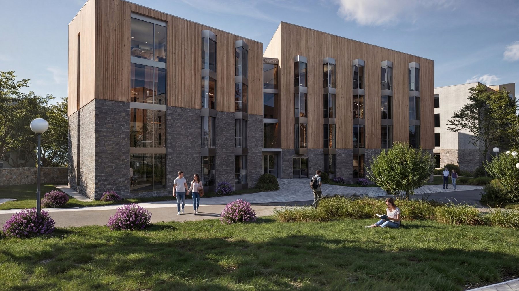 Timber and stone clad student accommodation block at Halo Village
