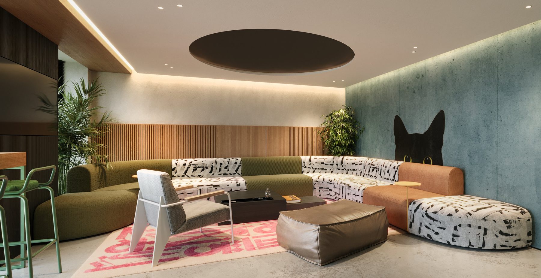 Shared lounge at Halo Village with curved sofas, timber panelling and a black cat mural