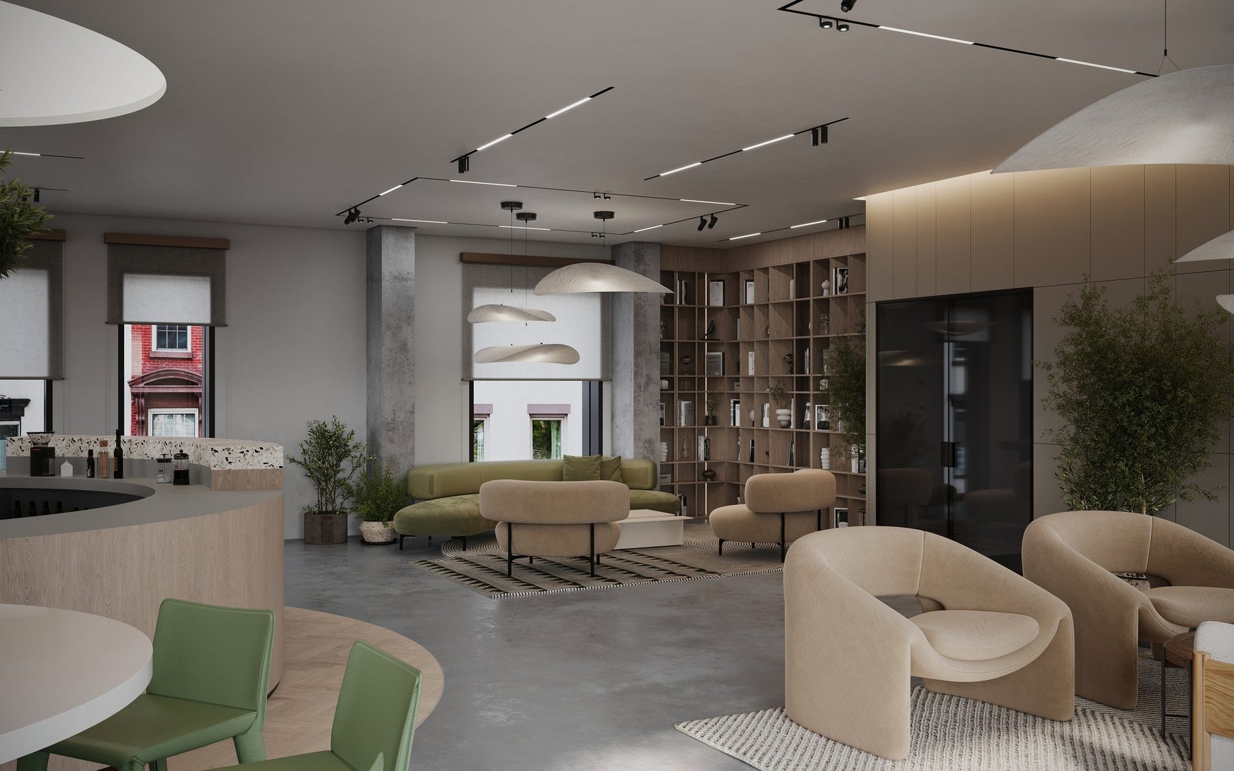 Open-plan study hub at Halo Village with desks, monitors and soft seating