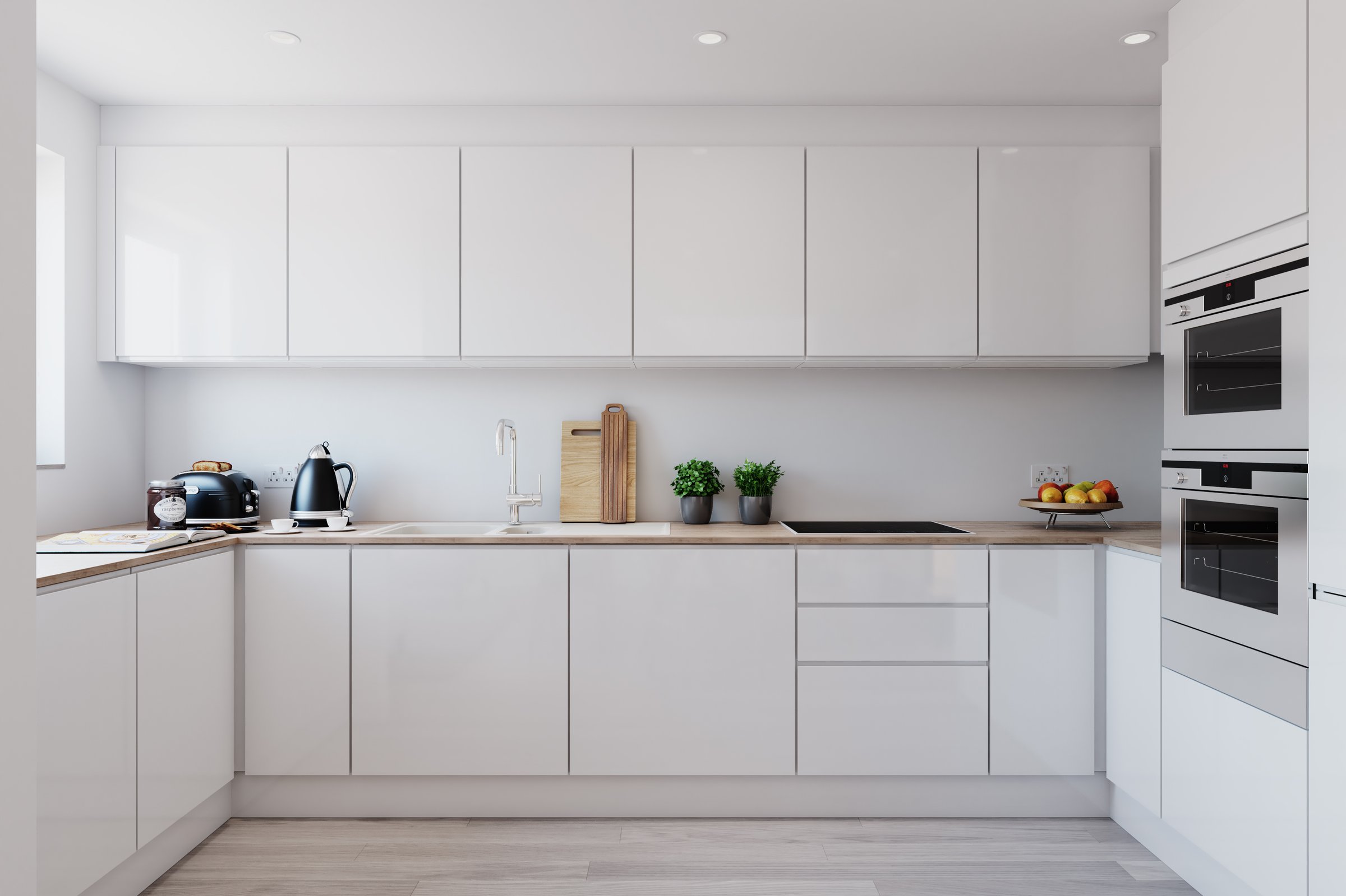 A white gloss zero carbon kitchen in a Verto home