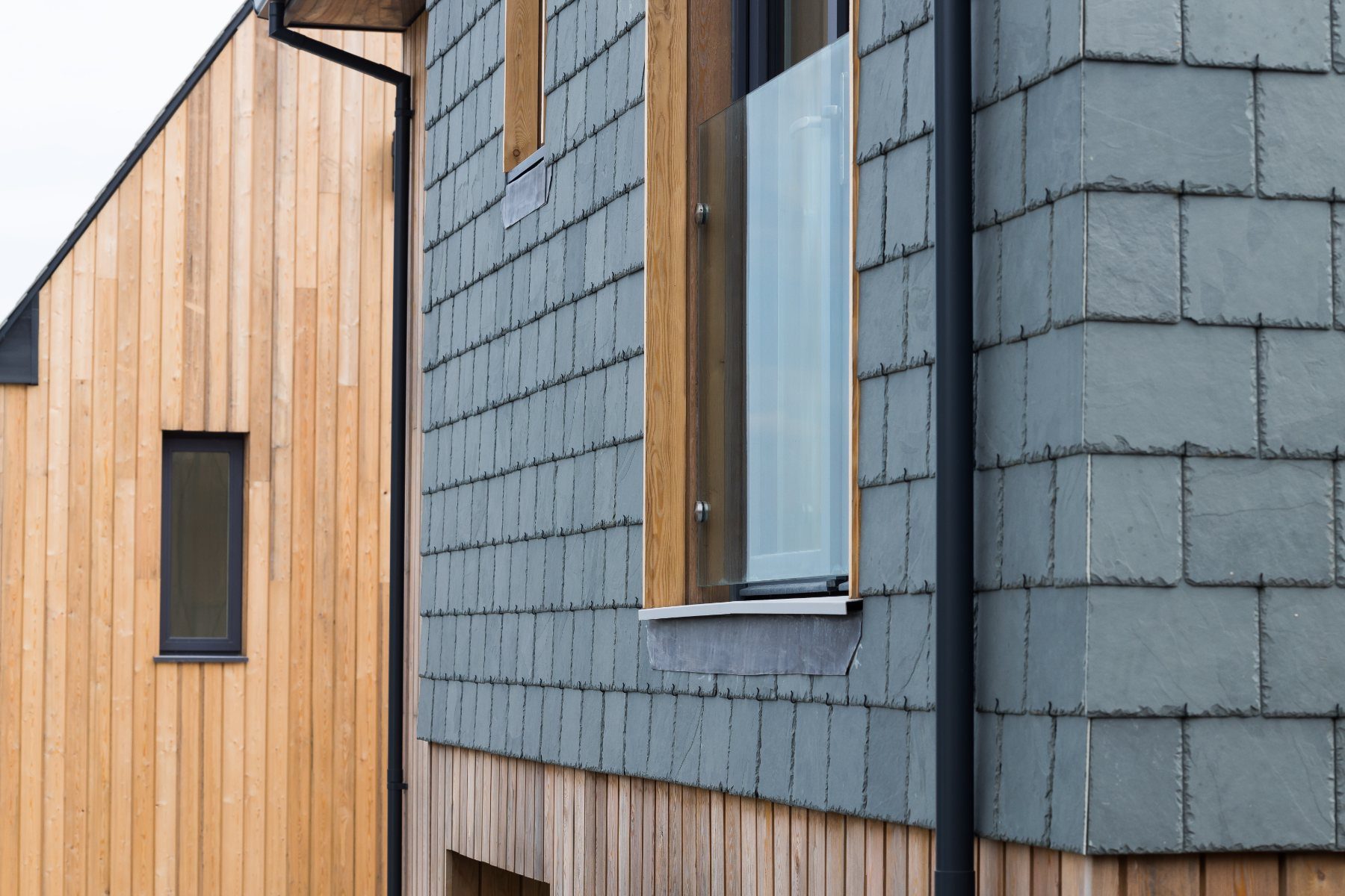Slate hanging and larch cladding detail
