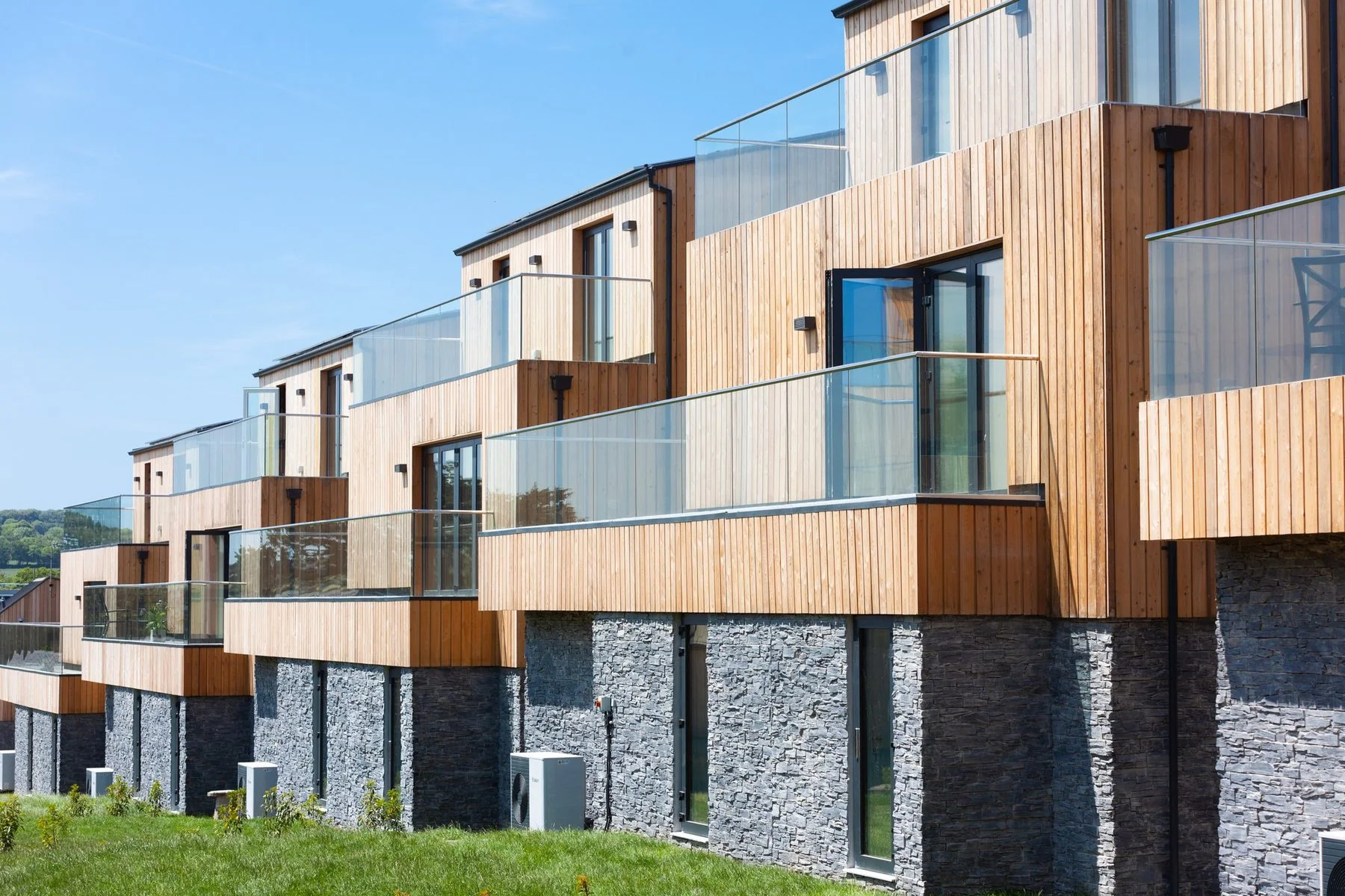 Stepped terraces with glass balconies at The Green